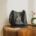 Black leather coach purse shoulder bag with stylish chain strap