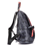 Color block daypack from VacationGrabs featuring a stylish design with adjustable straps and a unique color scheme