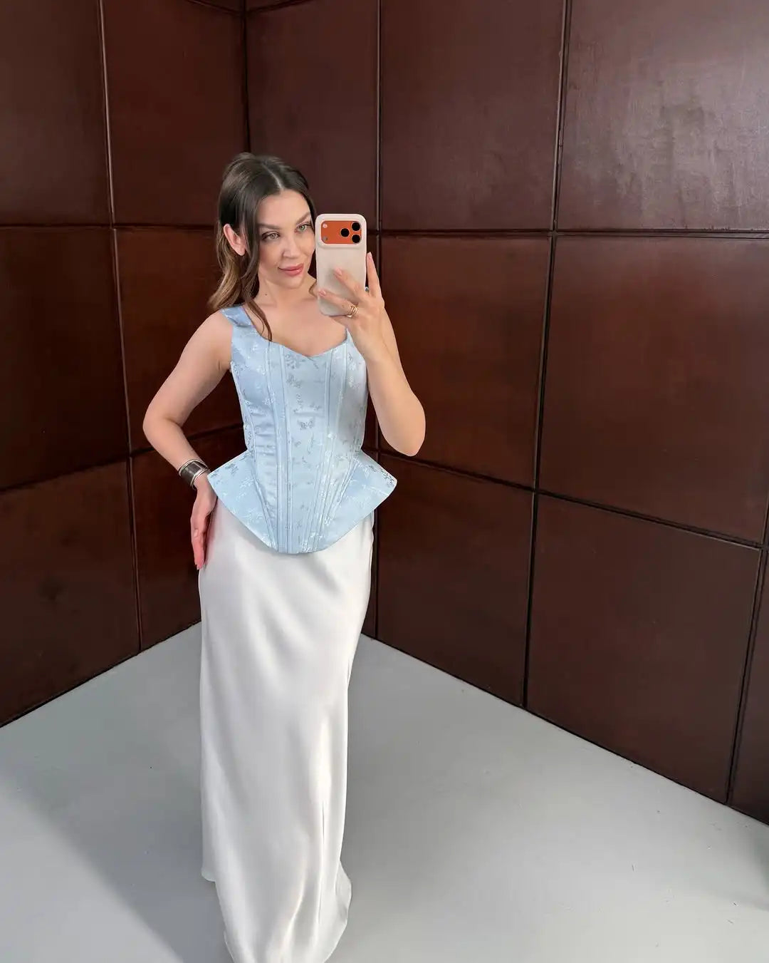 Women's light blue cropped top with elegant design for stylish events