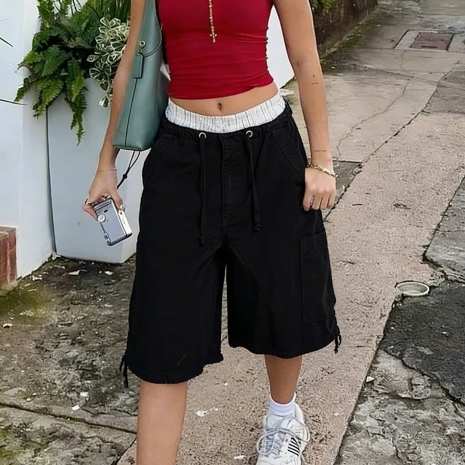 Women's black shorts in denim, casual streetwear for summer outings