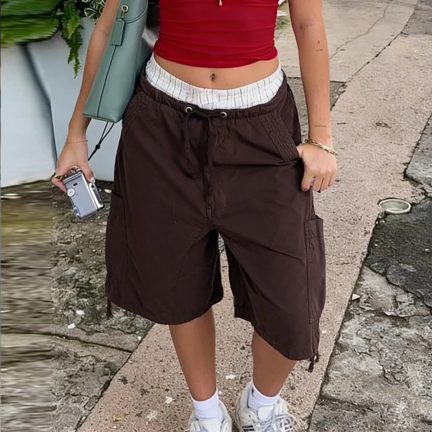 Women's brown shorts in denim, perfect for casual summer outings