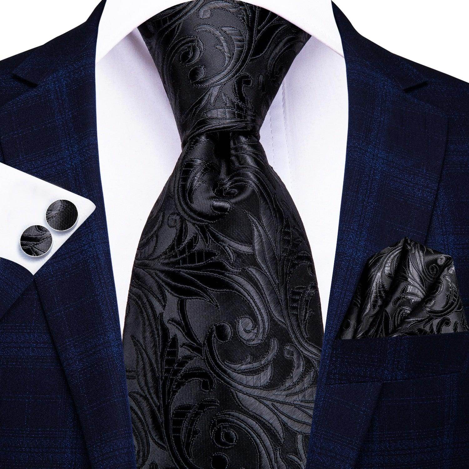 Elegant black designer wedding ties for men with paisley pattern, suitable for formal occasions