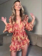 Floral mini dress with puff sleeves, perfect for summer outings