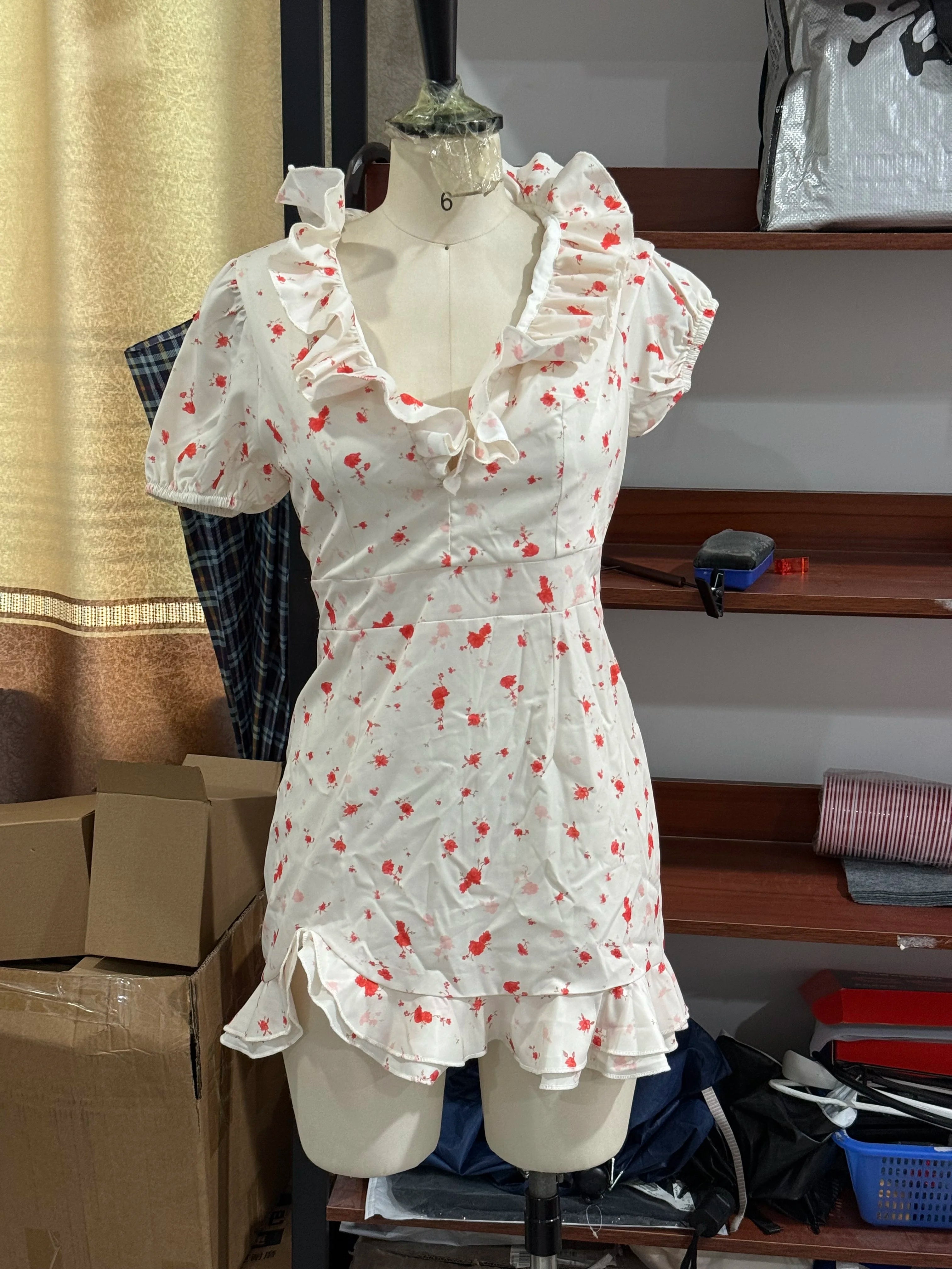 Women's white mini dress with floral print, perfect for summer outings