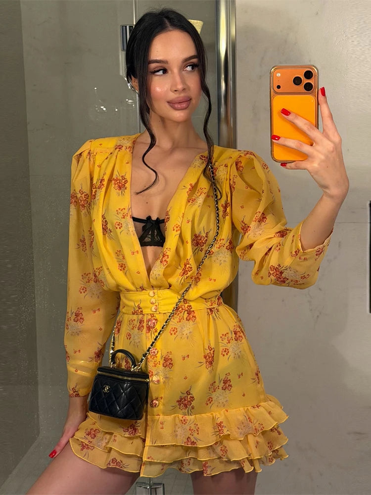 Women's yellow mini dress with floral patterns, perfect for casual outings