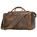 Brown leather duffle bag, durable, ideal for travel and weekend trips