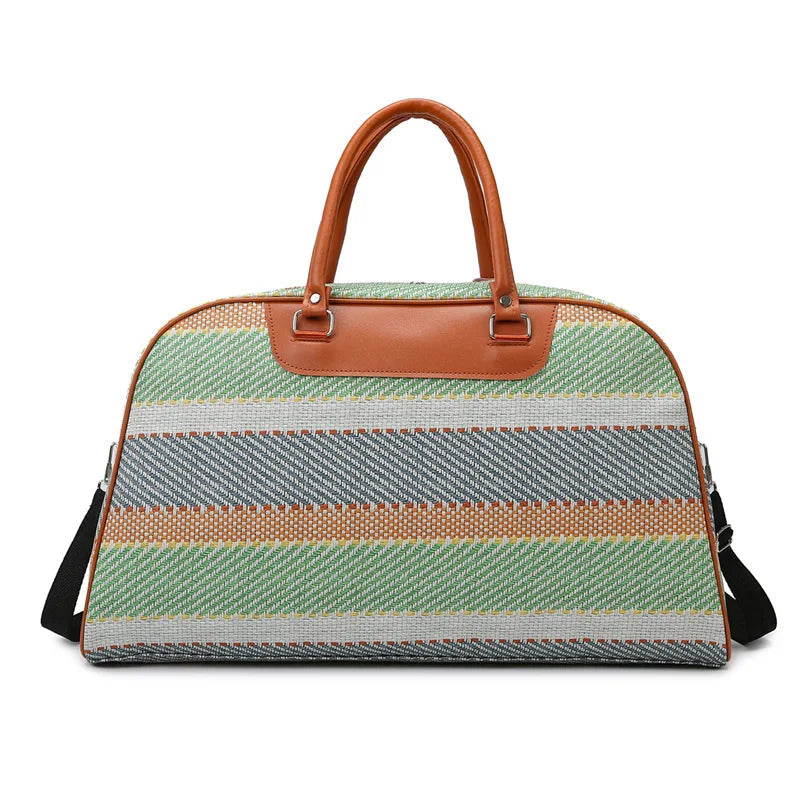 Colorful striped duffle bag with leather handles for travel