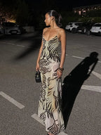 Women's sheer animal print maxi dress for evening outings.