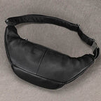 Hands-free leather fanny pack in sleek black design perfect for travel and everyday use