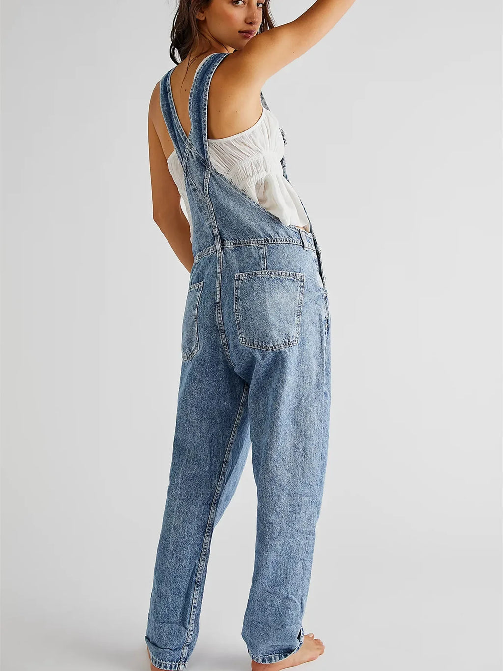Ladies overalls denim in light blue, perfect for casual outings.