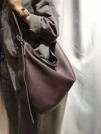Leather crossbody mini bag in deep brown, perfect for casual outings