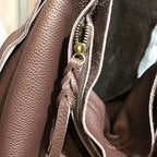 brown leather crossbody mini bag with stylish zipper detail