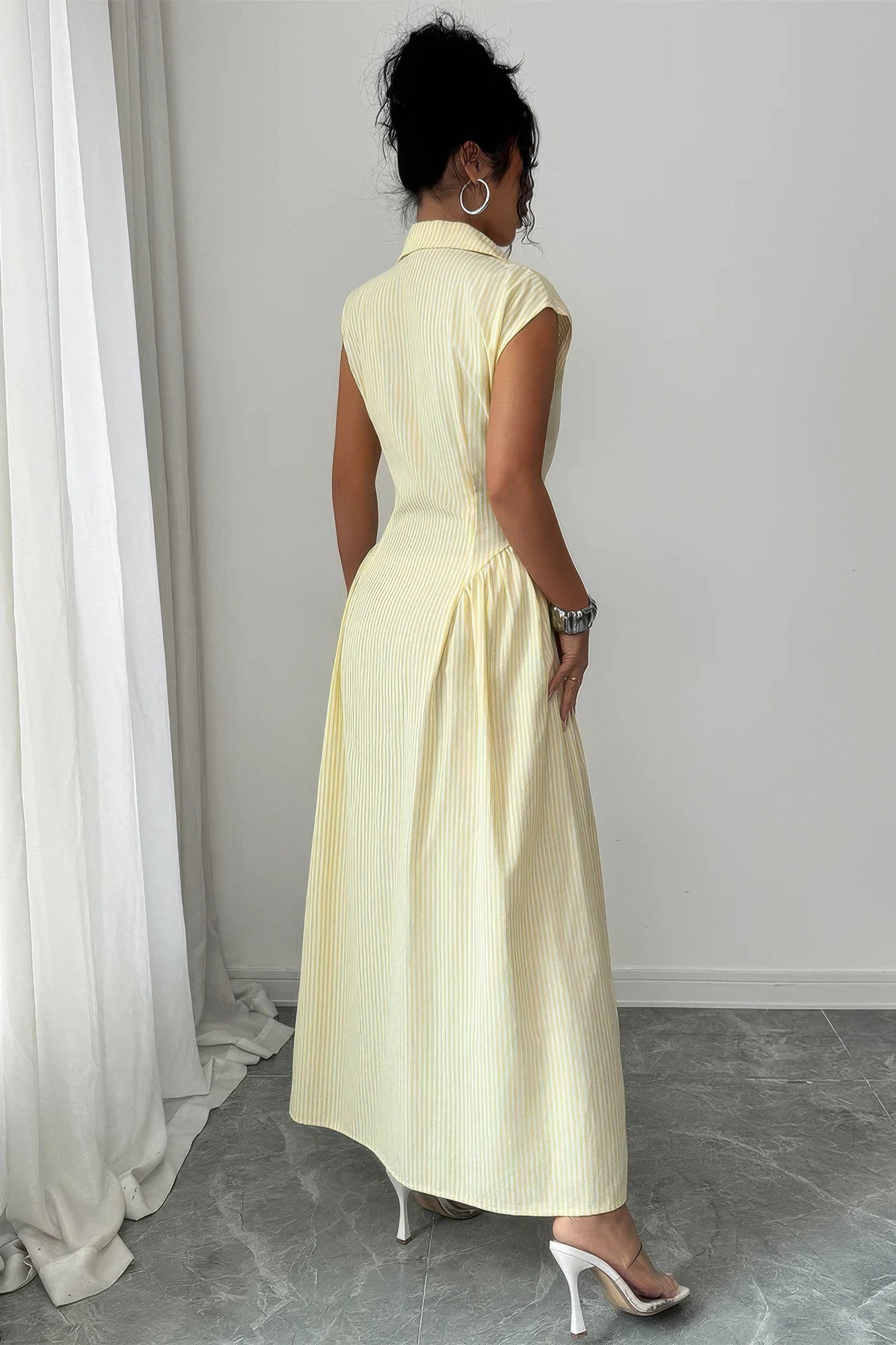 Women's long dress and long sleeve in soft yellow, perfect for summer outings