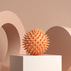 Peach massage ball for muscle relaxation, perfect for stress relief