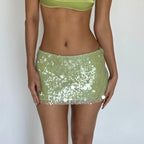 Women's green mini skirt with sequins for summer outings