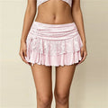 Women's pink mini skirt with lace detail for summer outings