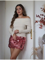 Shiny pink sequin mini skirt, perfect for parties and nights out