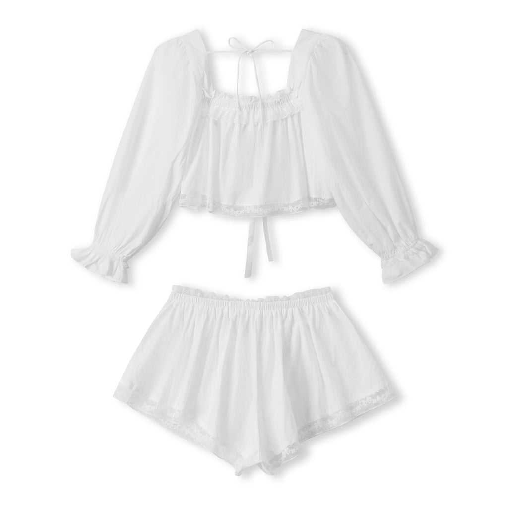 Women's white pajama set in soft fabric for cozy lounging