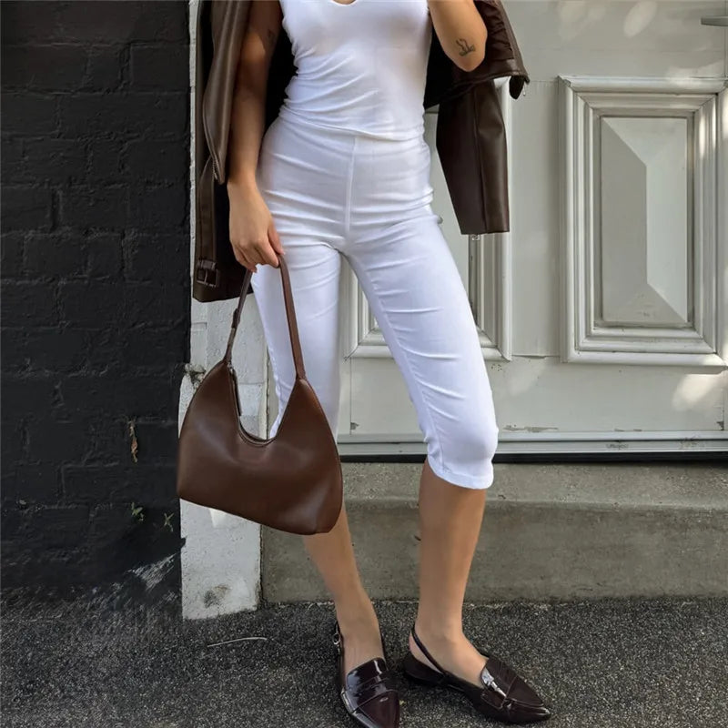 Women's white polka dot pants, stylish summer outfit for casual outings