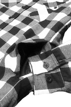 WEIV men's flannel shirt in black and white, perfect for layering under a quilted jacket