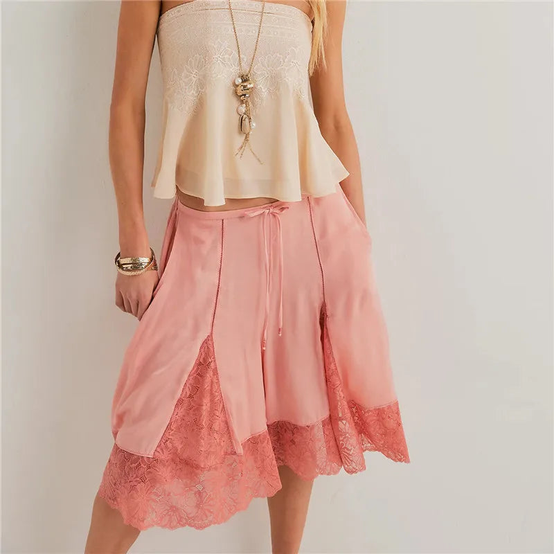 Women's pink satin pajamas shorts with lace trim for lounging