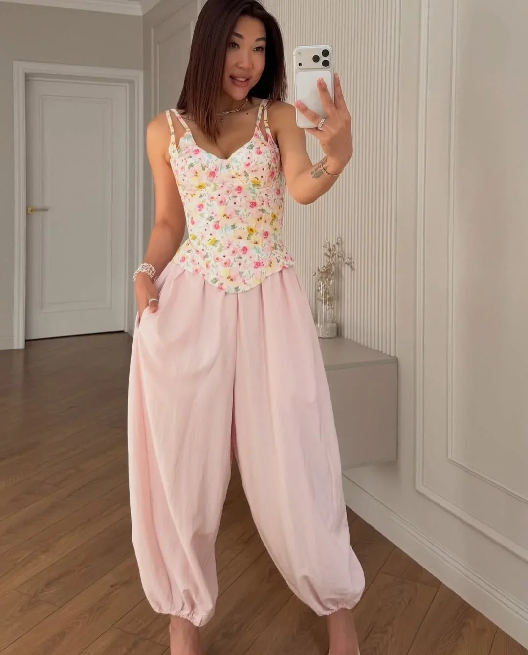 Floral top cami with adjustable straps and pink lounge pants