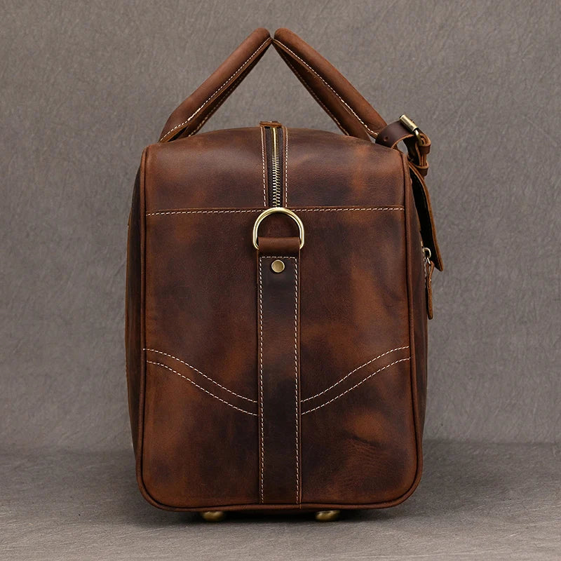 Brown leather travel bag for men, perfect for weekend getaways