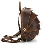 Accordion beetle daypack in brown leather with unique design and adjustable straps for stylish travel