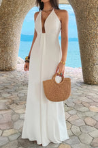 White halter neck maxi dress for beach vacations and warm weather