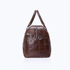 Brown leather weekend bag with spacious design for travel