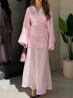 Women's pink wrap skirt in soft fabric for stylish everyday wear