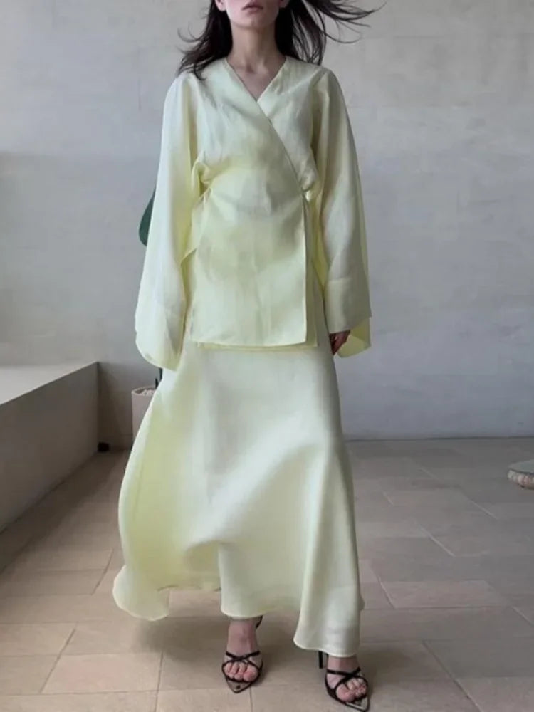 Women's yellow wrap skirt made from lightweight fabric for summer outings