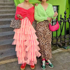 Women's pink tiered skirt from VacationGrabs, perfect for y2k fashion enthusiasts