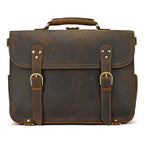Vintage leather laptop bag with brass buckles and a sturdy handle for professional use